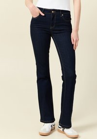 Клешеные брюки Клешеные брюки