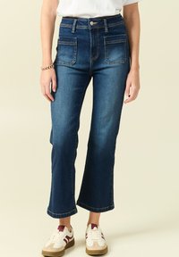 Клешеные брюки Клешеные брюки