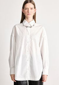 Длинная блузка Длинная блузка