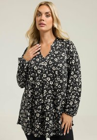 Длинная блузка Длинная блузка