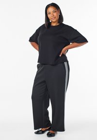 Широкие брюки Широкие брюки