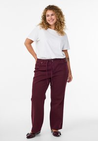 Клешеные джинсы Клешеные джинсы