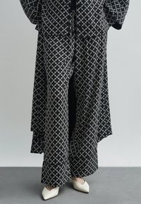 Широкие брюки Широкие брюки