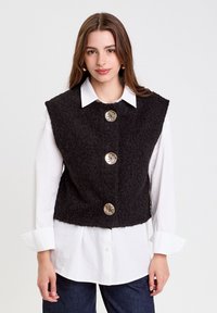 Жилет Жилет