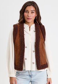 Жилет Жилет