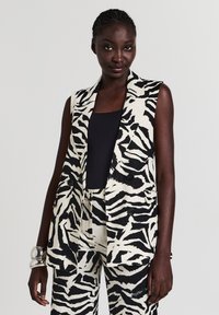 Жилет Жилет