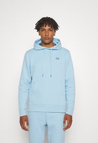 Спортивный костюм Спортивный костюм