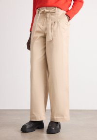 Широкие брюки Широкие брюки