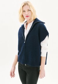 Жилет Жилет