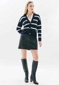 Жилет Жилет