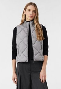 Жилет Жилет