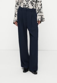 Широкие брюки Широкие брюки